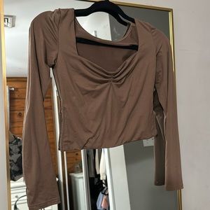 Brown long sleeve top. Ruched front